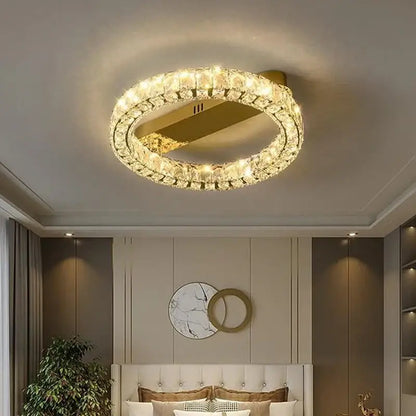 Modern gold-toned decorbites crystal ring ceiling light with embedded led bulbs for dimmable dining room decor