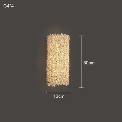 Modern crystal wall lamp featuring a rectangular gold sconce with clear and amber decorbites crystal wall elements