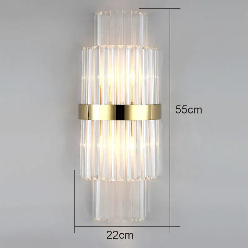 Modern crystal wall lamp featuring a clear glass tube with a gold accent band for elegant living room decorbites crystal wall lamp