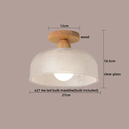 A warm-toned wooden ceiling lamp with clear glass dome and woven texture featuring decorbites crystal wood led design