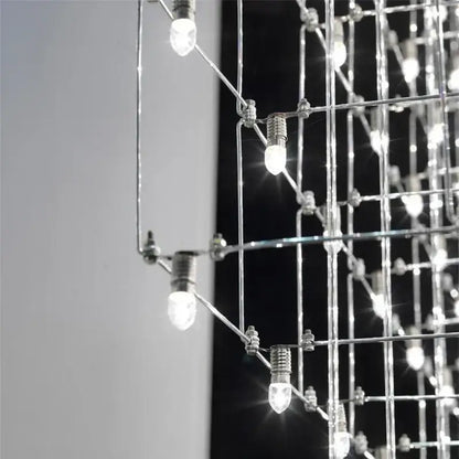 Modern cube led chandelier featuring polished chrome geometric grid and clear led bulbs for luxury decorbites cube led use