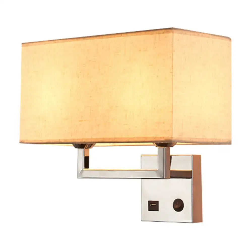 Modern cuboidal fabric wall light with beige white fabric shade and polished chrome frame for living room use