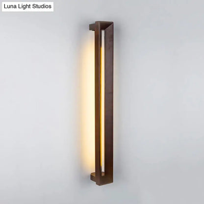 Modern dark brown wooden led wall sconce with bronze finish and sleek rectangular design for study room lighting