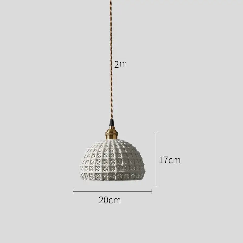 White ceramic led pendant lamp with textured geometric pattern and brass accents for modern bedroom lighting