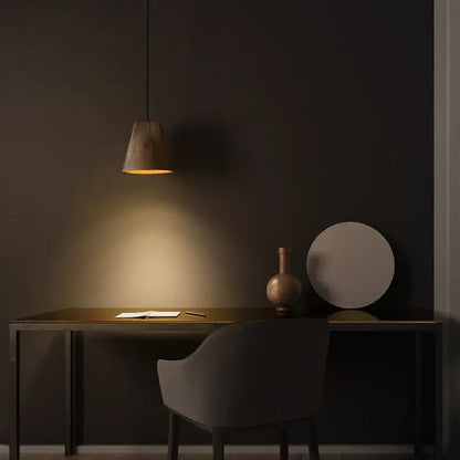 A warm-toned conical pendant light with a textured wooden shade as part of decorbites adjustable wooden chandelier for dining room decor