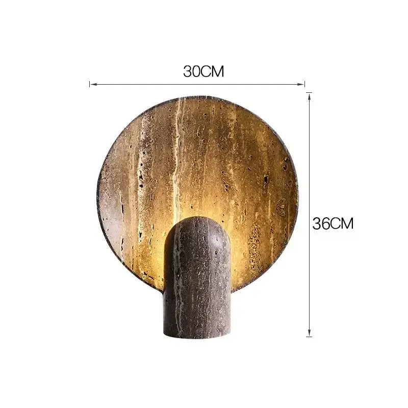 Modern dark travertine rock led table lamp with circular stone wall sconce and warm golden brown textured face