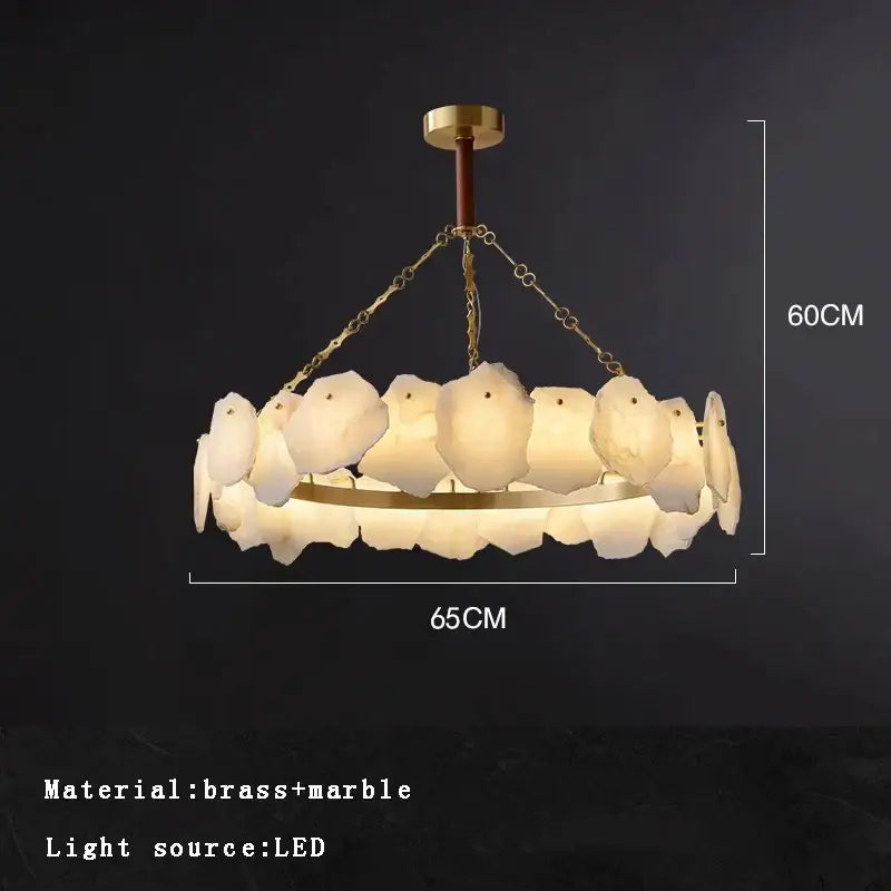 A modern decorbites brass marble ceiling chandelier with translucent white marble petals and a central brass frame