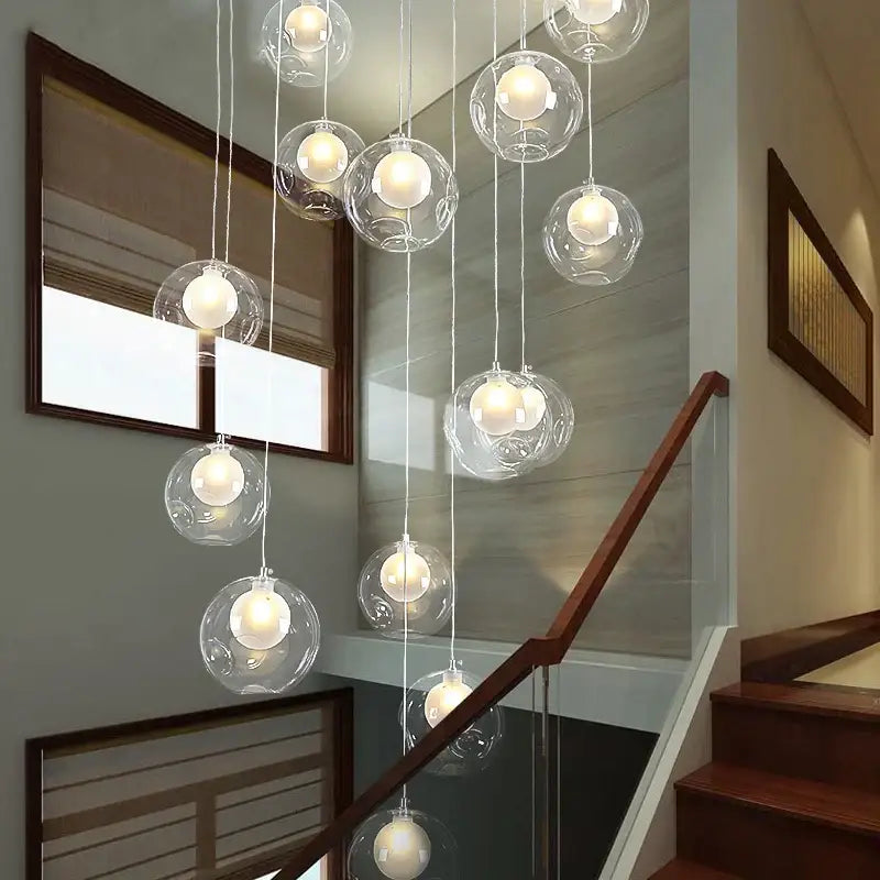 Clear glass bubble led chandelier with warm white bulbs by decorbites for modern dining room lighting