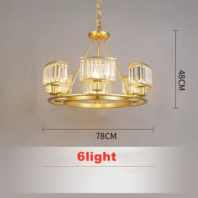 Modern decorbites copper crystal chandelier with six gold-toned crystal-encased lights and circular base for dining room