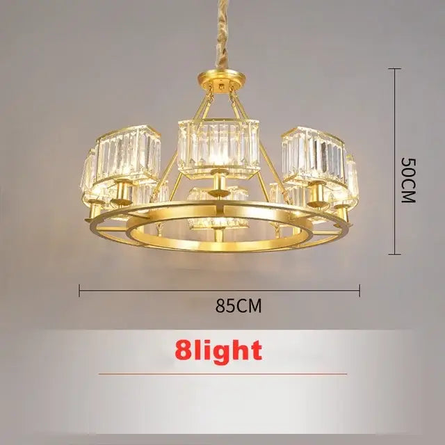 Modern decorbites copper crystal chandelier with gold-toned circular frame and eight crystal-encased lights for dining room