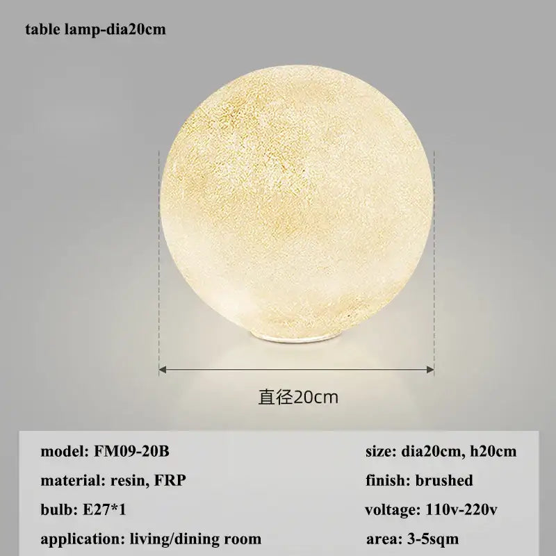 A round cream moon led pendant chandelier by decorbites with a brushed resin textured surface mimicking moonlight