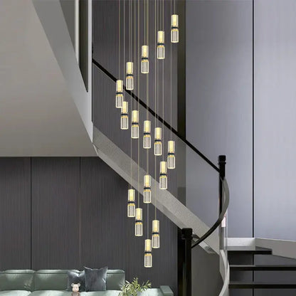 Modern decorbites crystal columnar chandelier with clear glass cylinders and gold-toned accents for stairway lighting