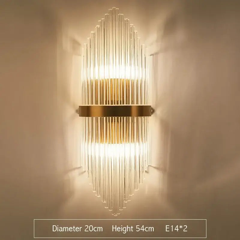 Modern decorbites crystal gold led wall sconce with gold-toned metal and clear glass rods for bedroom lighting