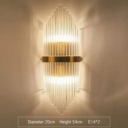 Modern decorbites crystal gold led wall sconce with gold-toned metal and clear glass rods for bedroom lighting