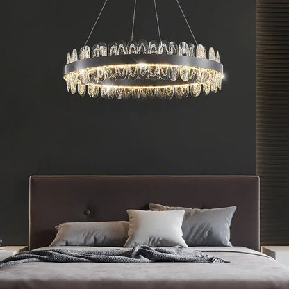 Modern Decorbites crystal led chandelier with sleek black metal frame and cascading clear crystal droplets for living room