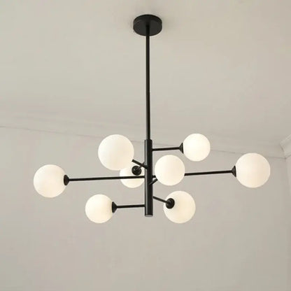 Black metal modern decorbites glass brass chandelier with frosted white spherical glass globes for living room