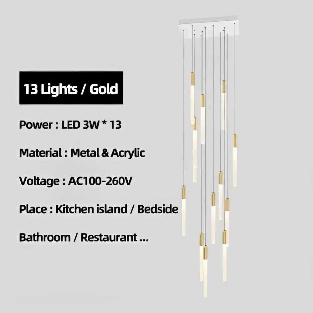 A modern decorbites luxe gold tube chandelier with 13 slender led bulbs on white metal acrylic mount for dining room lighting