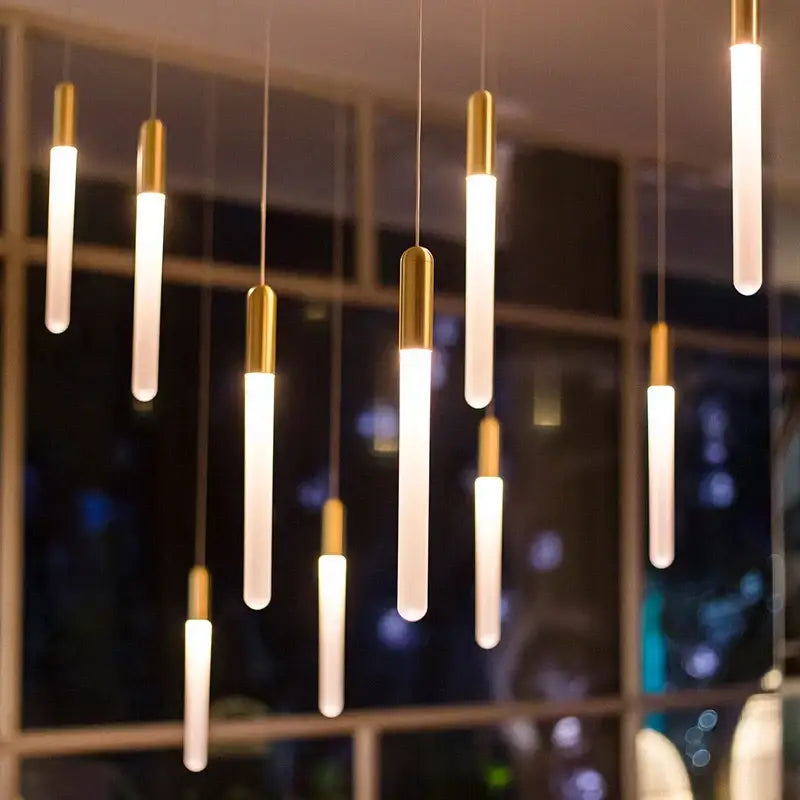 Modern decorbites luxe gold tube pendant lights with frosted glass and gold-toned caps for dining room lighting