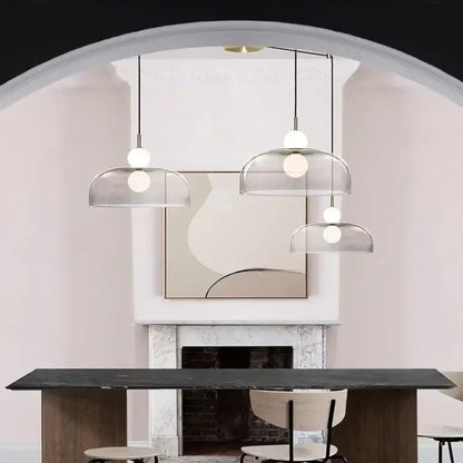 Three modern frosted white bulbs double balls glass pendant light hang in a minimalist kitchen dining space chandelier