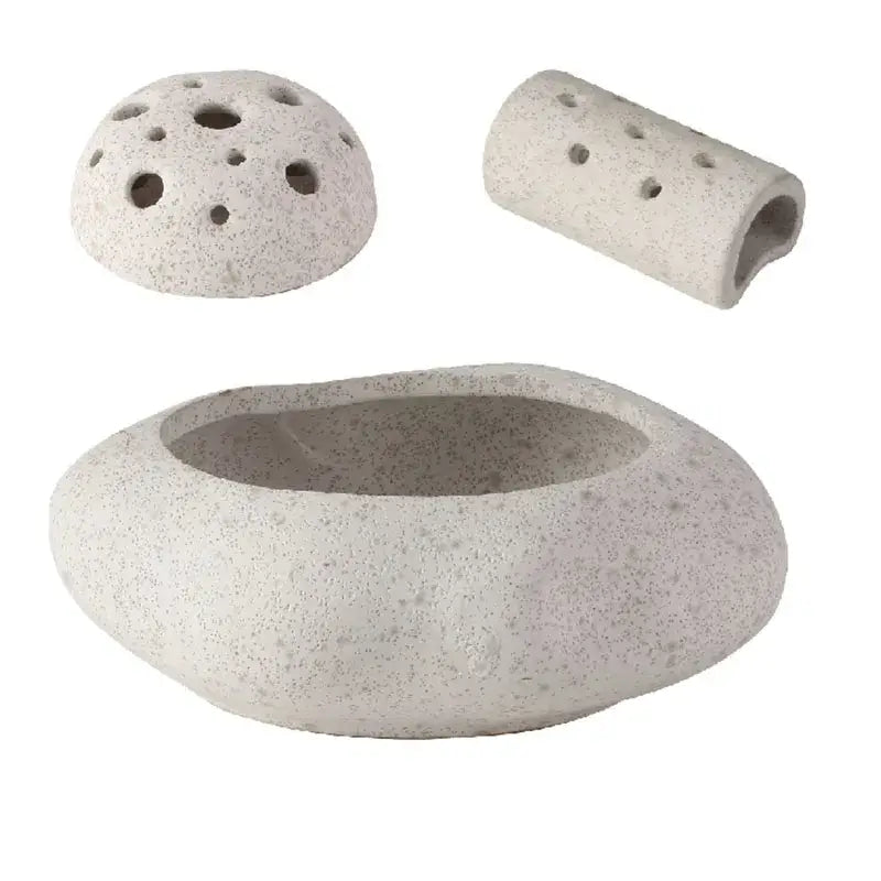 Modern earthy lotus seedpod ceramic incense burner with light gray speckled stone, rounded base, and perforated dome lid