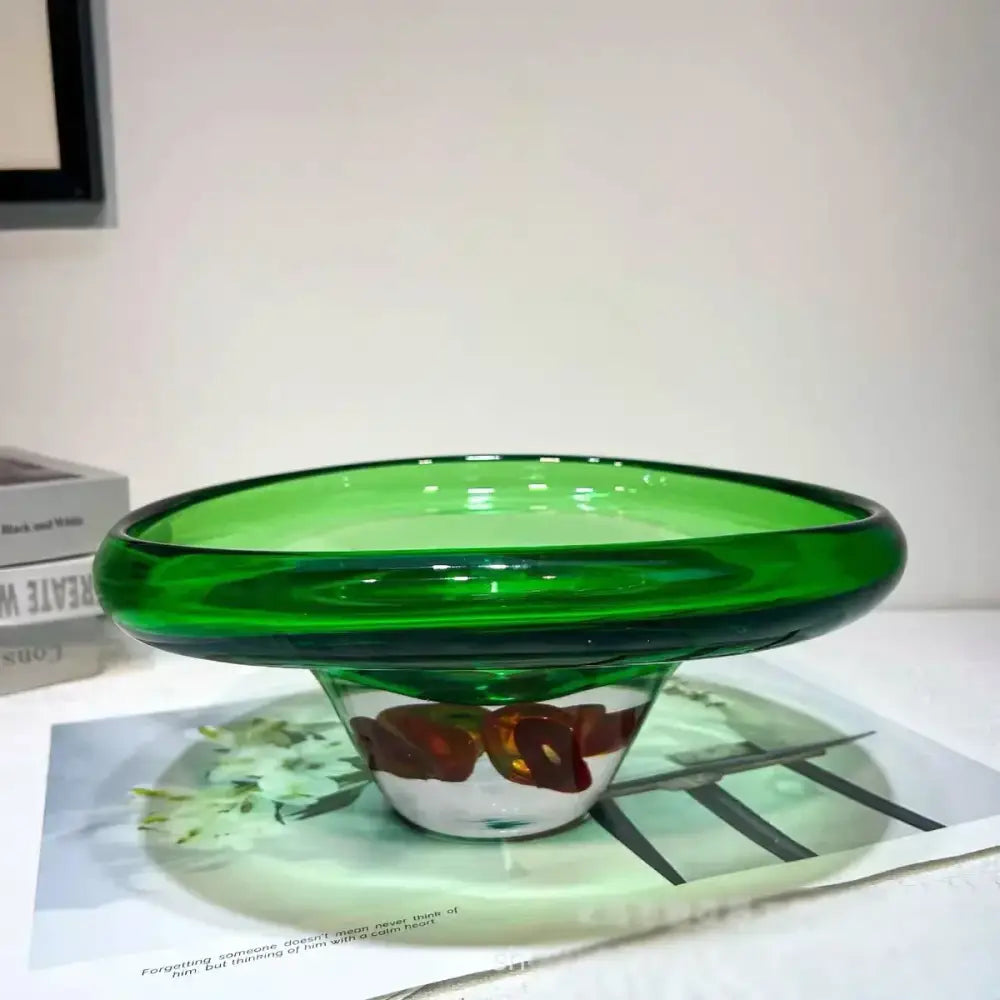 A vibrant green glass decorbites clear fruit tray vase with an amber-brown floral design for living room decor