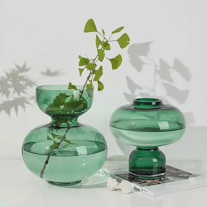Two translucent green glass green gourd vases with rounded double-bulb design for modern living room decor