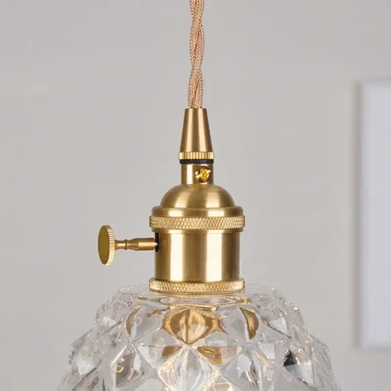 Modern faceted clear glass pendant lamp with gold-toned brass fixture and kitchen knob switch by decorbites clear glass
