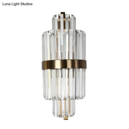Modern faceted crystal bronze wall light with clear crystal prism and brass accents two lights for bedroom use
