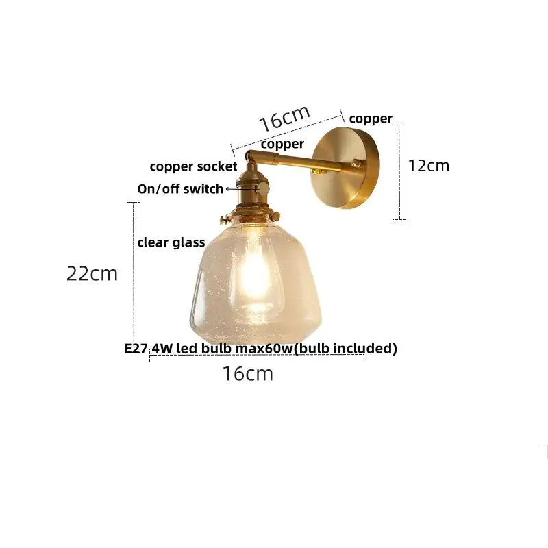 Modern faceted glass copper wall lights featuring a copper finish and clear glass shade as bedroom wall lights