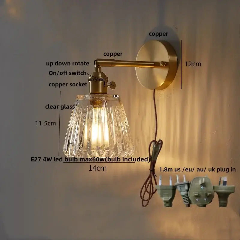 Vintage-style bedroom sconce wall lights with brass-finished copper arm and clear faceted glass copper wall shade