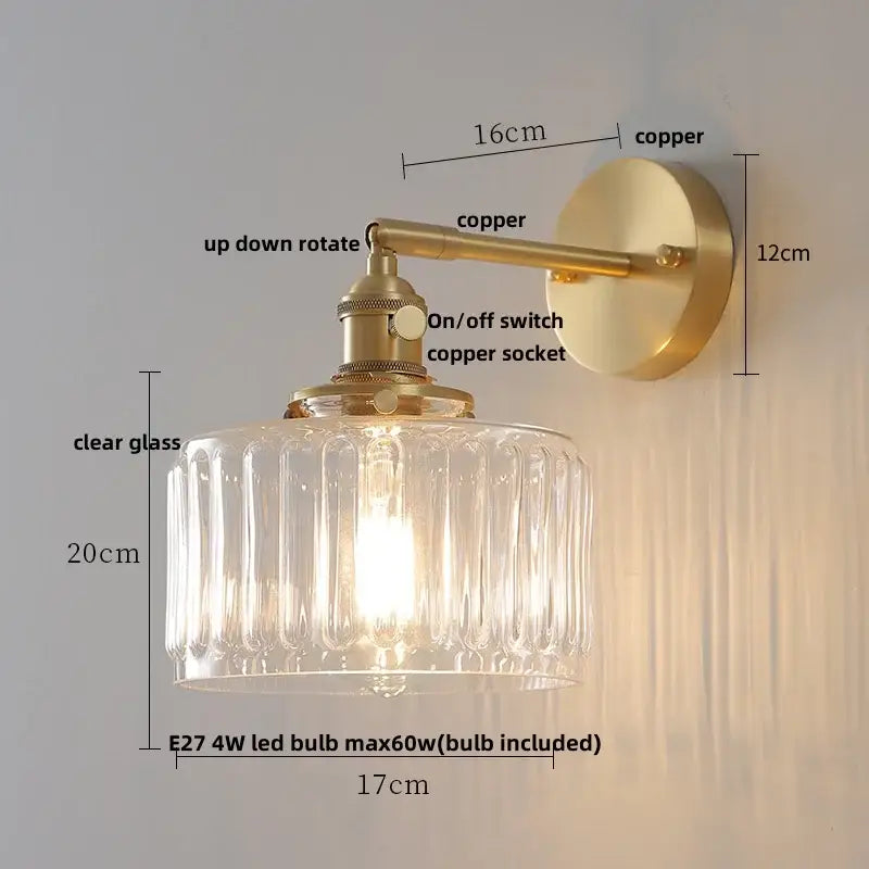 Vintage-style wall lights with faceted clear ribbed glass and copper finish for modern bedroom decor