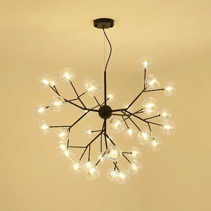 Black metal modern firefly glass round ball chandelier with clear glass globes in a branching design for dining room lighting