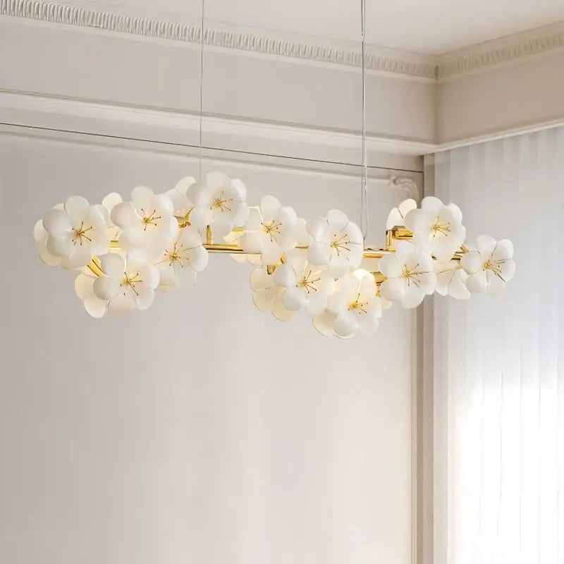 Modern floral white and gold pendant light with delicate flowers and metal finish for practical illumination in kitchens