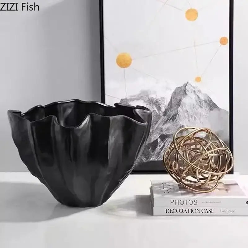 Black ceramic bud vase with fluted petal-like rim and glossy finish for modern decorbites black resin floral decor