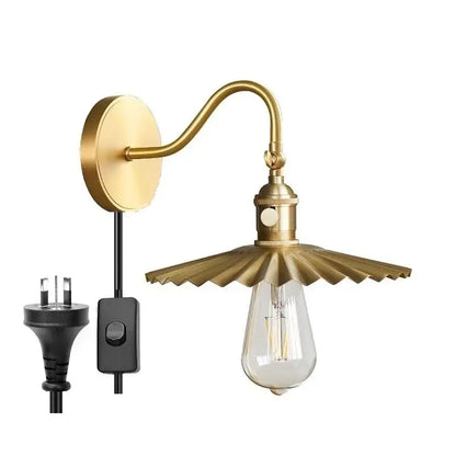 Brass-finished modern fluted wall sconce with scalloped shade and exposed Edison bulb decorbites adjustable copper wall light