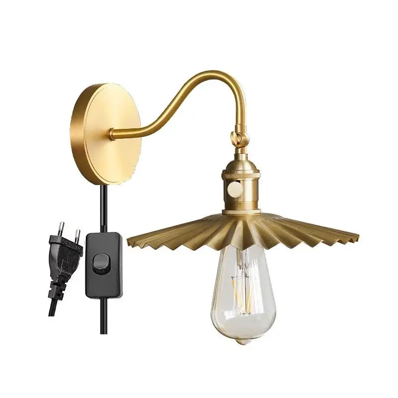 Modern fluted brass wall sconce with petal-like shade and exposed Edison bulb decorbites adjustable copper wall light