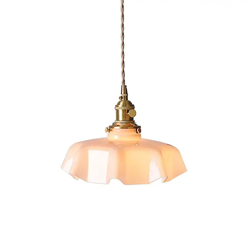 Modern fluted cream glass pendant lights with warm peach glass pendant shade and brass hardware for dining room
