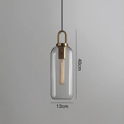 Modern frosted gray glass ball pendant light with clear glass pendant light and brass-finished frame decorbites glass ball