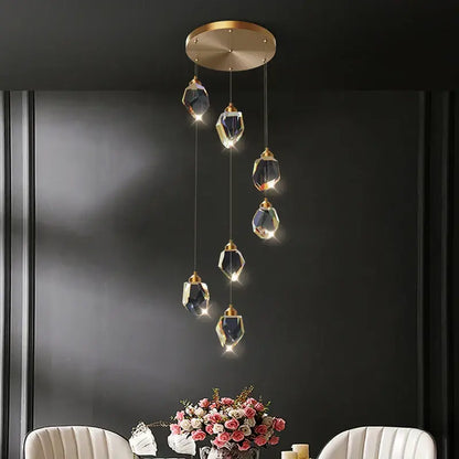 Modern geometric black and gold crystal diamond chandelier with five brass-capped glass orbs by decorbites crystal