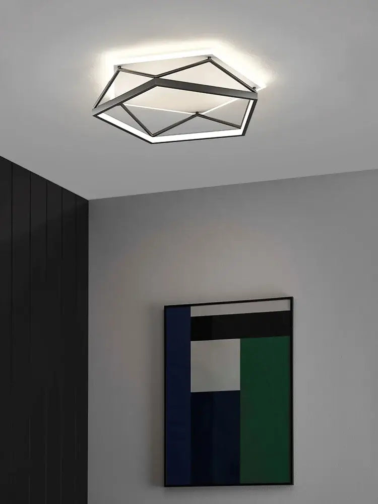 Modern geometric black metal led ceiling lamp with angular design and frosted glass panels for bedroom decorbites geometric led