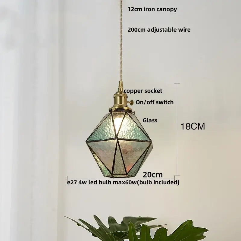 Modern geometric blue glass pendant light with brass accents and copper socket for dining room decorbites blue glass design