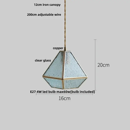 Modern geometric pendant light with blue glass panels and brass frame suspended from 20cm adjustable wire decorbites blue glass