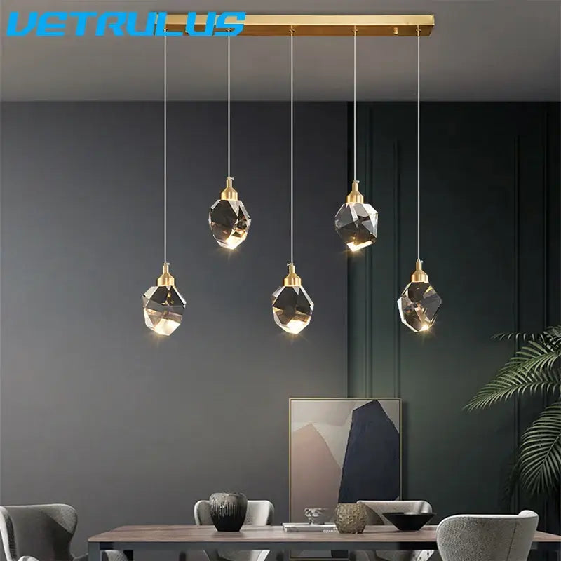 Modern geometric brass diamond crystal led chandelier featuring gold-toned pendant light with minimalist design