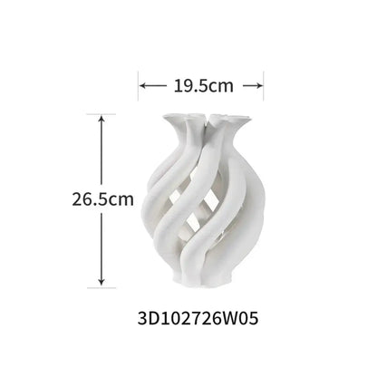 A sleek white ceramic spiral vase with a twisted geometric ceramic design for decorbites living room decor