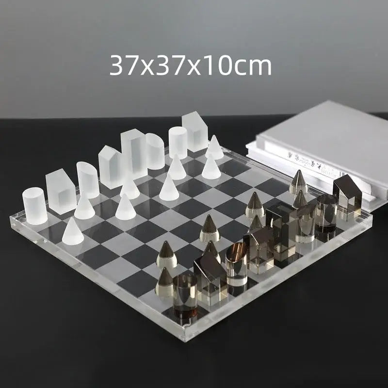 Modern geometric crystal chess set with transparent acrylic frosted white and metallic silver pieces for living room decor