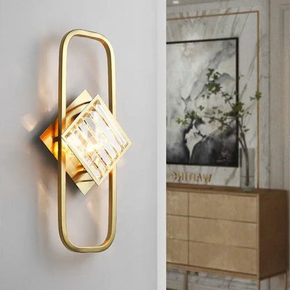 Gold-finished rectangular wall lamp with geometric design and clear crystal accents for decorbites crystal gold wall decor