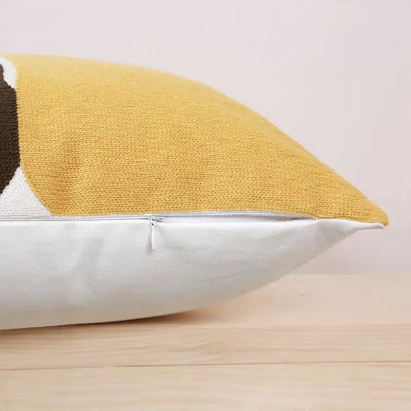Yellow and white woven fabric pillow cover with brown accent featuring geometric embroidery for living room decorbites