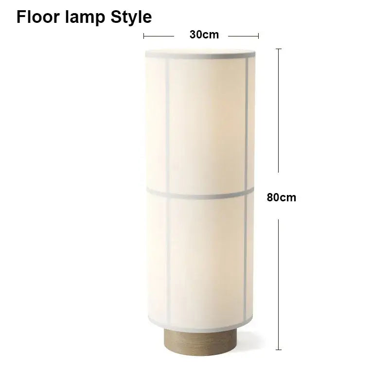Cream-colored cylindrical fabric pendant light with wooden base featuring subtle vertical lines for modern decorbites hashira cluster