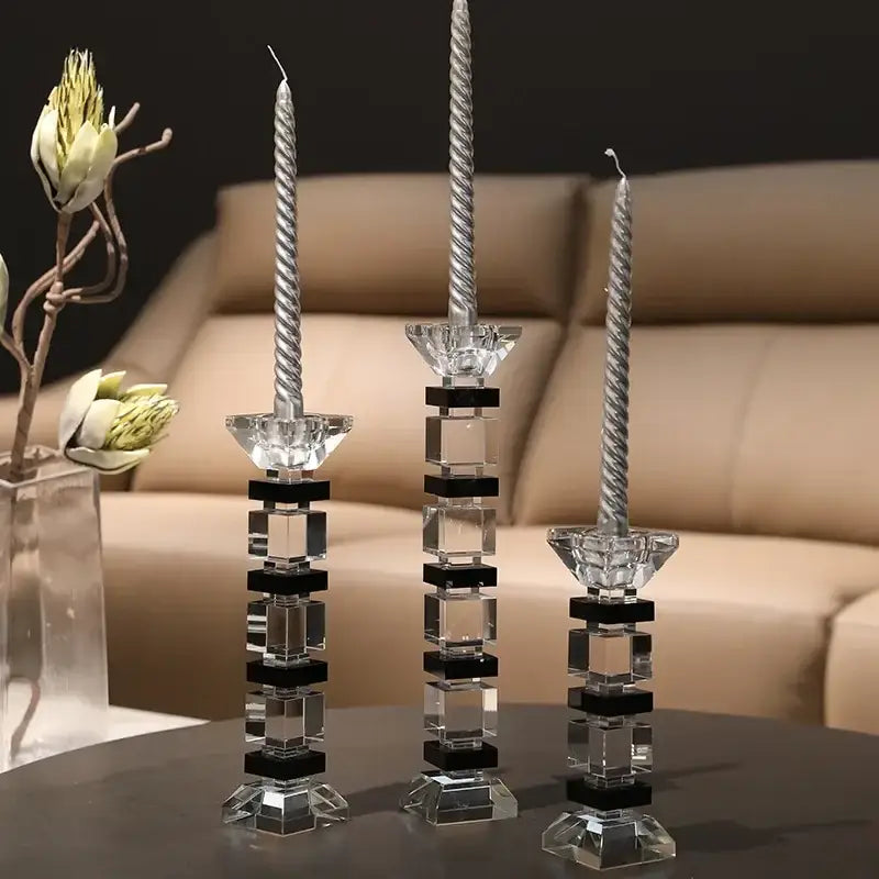 Set of three modern crystal candle holders with black square accents and twisted silver candles for decorbites geometric glass block design
