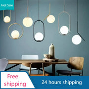 Modern geometric glass pendant lights with spherical shades and gold black silver metal frames for bedroom bedside chandeliers